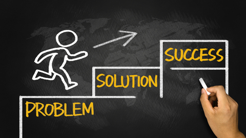 Chalkboard steps from problem to success