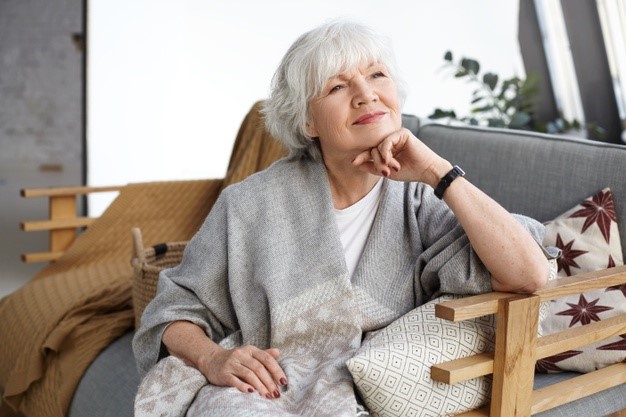 a woman using Buteyko Breathing Techniques at home