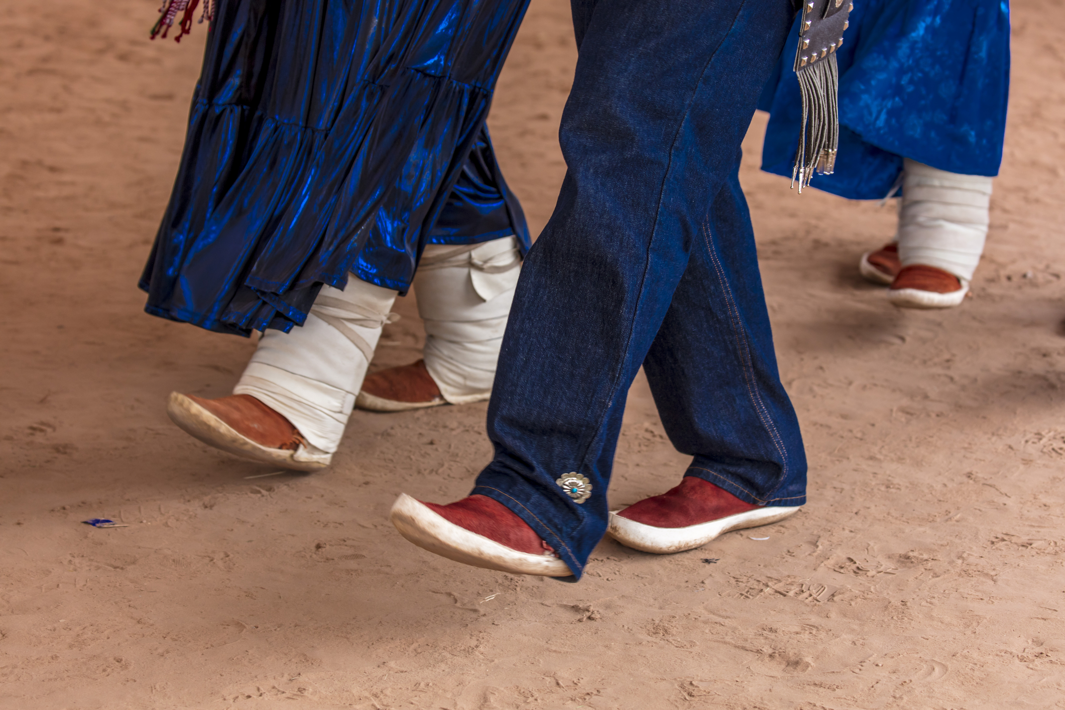 Close-up of dancers' feet in moccasins